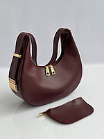 Элегантная бордовая женская сумка багет полумесяц