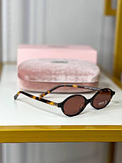 Жіночі леопардові круглі сонцезахисні окуляри Miu Miu MU 04ZS 19P2Z1 із золотим логотипом Міу Міу, фото 5