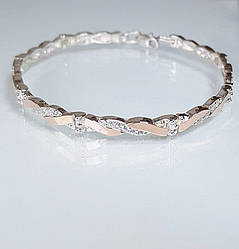 Срібний браслет з золотими накладками і фіанітами