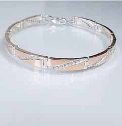 Срібний браслет з золотими пластинами