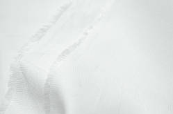Біла саржа в рулонах