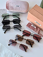 Стильні сонцезахисні окуляри з олійною оправою