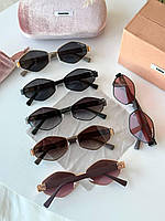 Стильні сонцезахисні окуляри з олійною оправою