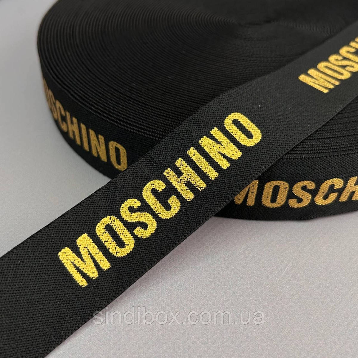 Резинка поясна брендована 3 см чорна з жовтим MC