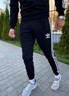 Спортивні штани adidas з лампасом