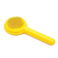 Пуходерка з кнопкою Brush cleans wool кругла жовта, 15 см