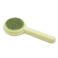 Пуходерка з кнопкою Brush cleans wool кругла оливкова, 15 см
