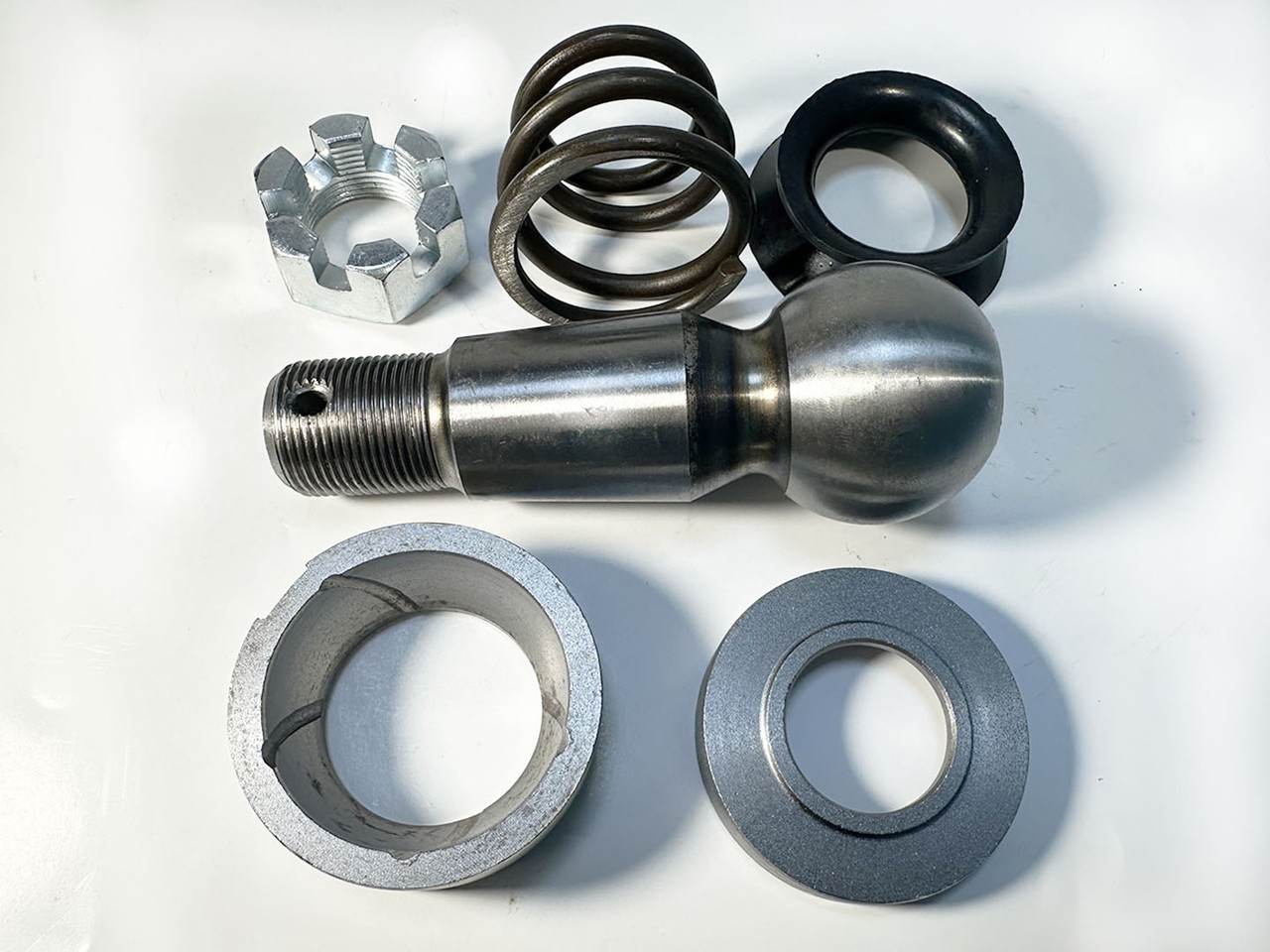 Палець кермовий КамАЗ у зборі (палець, вкладиші, гайка, пружина, пильовик) (ДЕХЕН, Китай) 5320-3414032