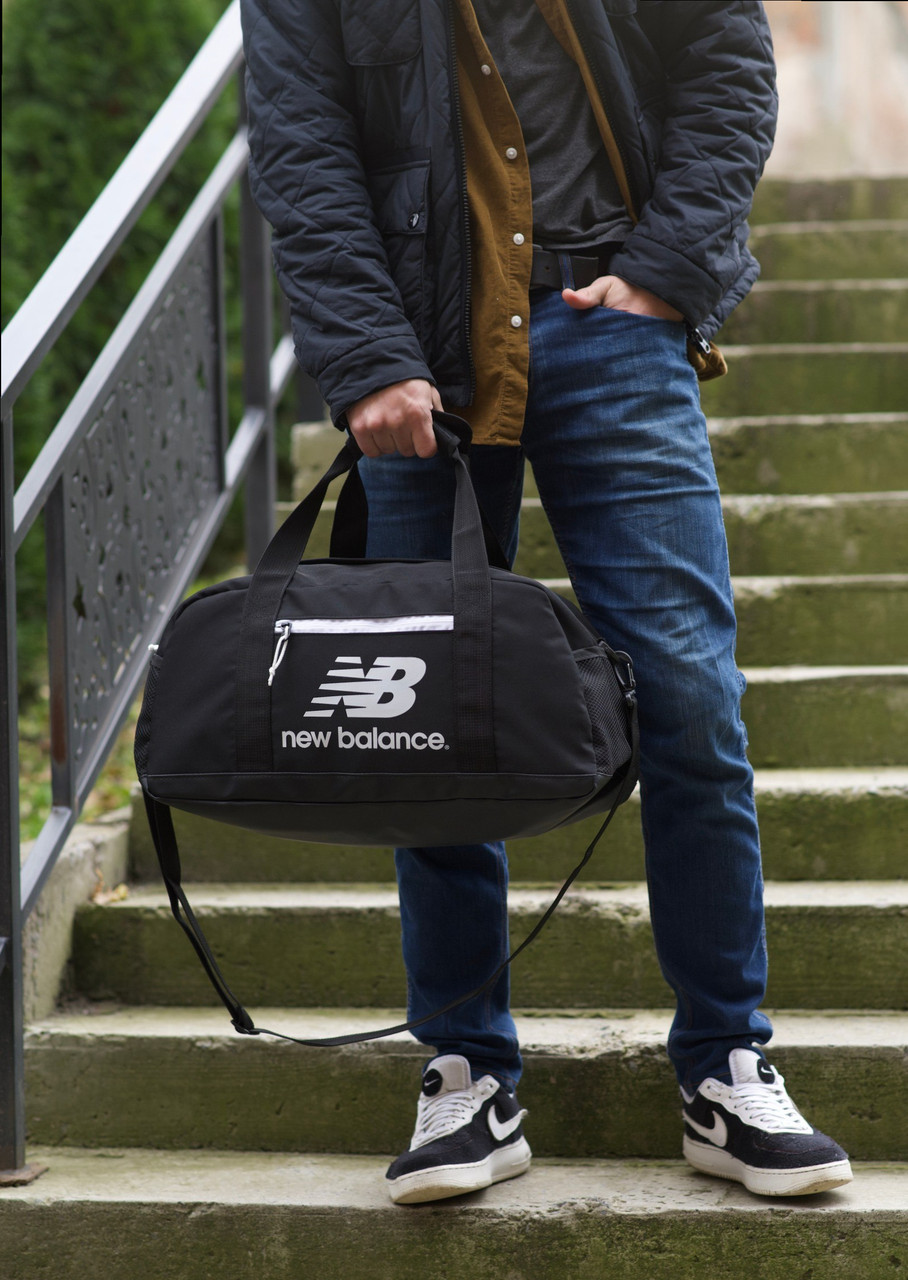 Чорна сумка для спорту та подорожей - практичний вибір New Balance, фото 1