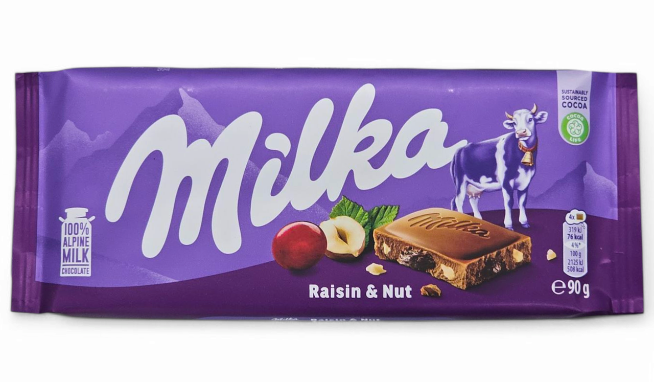 Молочний шоколад Milka Rising & Nuts Родзинки та Горіхи 90г