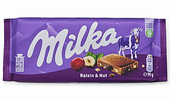 Молочний шоколад Milka Rising & Nuts Родзинки та Горіхи 90г