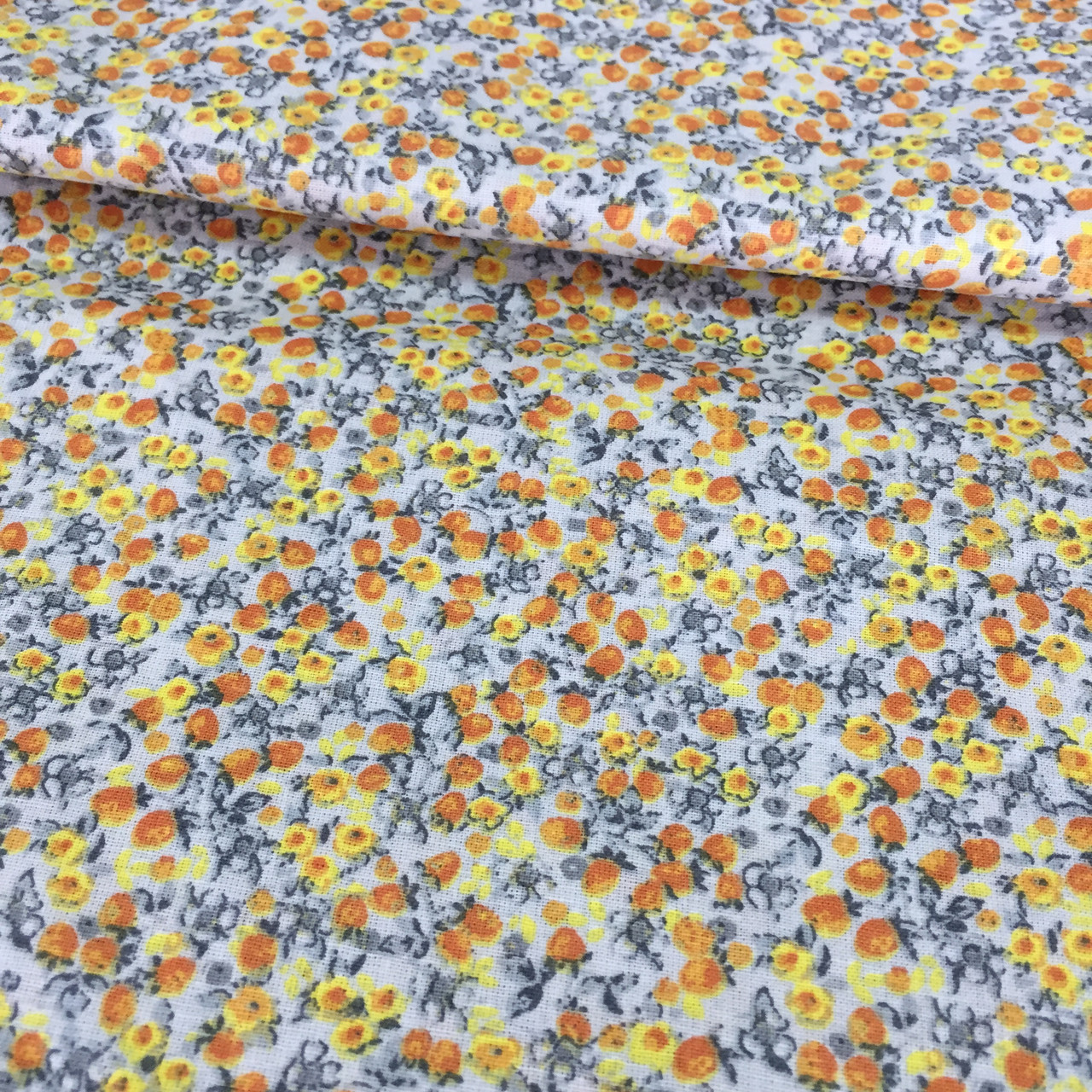 Тканина з дрібними жовтими та жовтогарячими квіточками, фото 1
