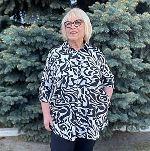 Блузка на ґудзиках великого розміру