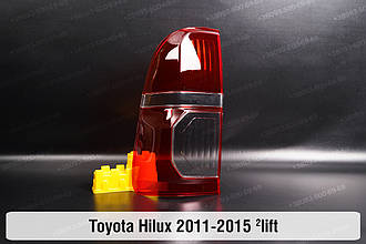 Скло заднього ліхтаря Toyota Hilux (2011-2015) 2 рест ліве