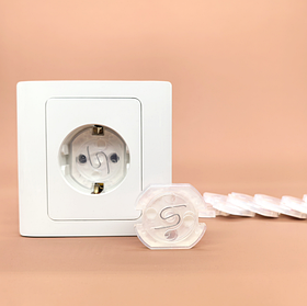 Заглушки для розеток підпружинені Прозорі. (00285)