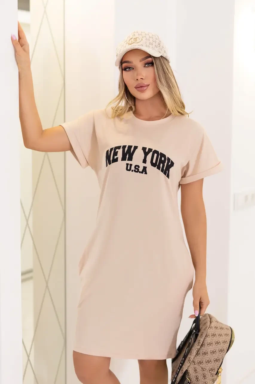 Жіноча сукня туніка бежевого кольору з кишенями з м'якого куліра