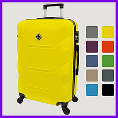 Валіза дорожня з висувною ручкою на коліщатках Bonro 2019 (середня) жовта 58 л ABS-пластик з кодовим замком