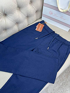 Лляні чоловічі штани Loro Piana синього кольору на зав'язках