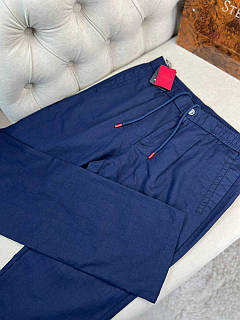 Лляні чоловічі штани Kiton синього кольору на зав'язках