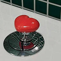 Кнопка ручка для зливного бачка унітазу у формі серця. Червона