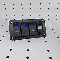 Панелі з 3 перемикачами, двома USB-портами та цифровим вольтметром.