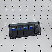 Панелі з 4 перемикачами, двома USB-портами та цифровим вольтметром.
