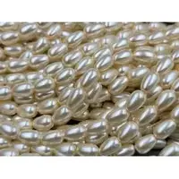 Перли Крапля скло 6*9мм айворі (+-50шт)