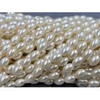 Перли Рис 5*7,5 мм айворі (+-50шт)
