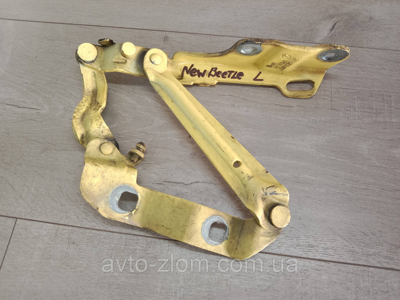 Петля капота Volkswagen New Beetle. 1998 – 2010. Ліва. 1C0823301D., фото 1