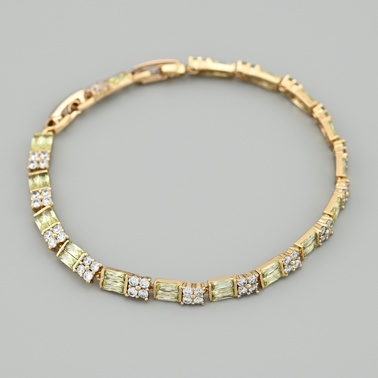 Браслет Оріноко 50830 ширина 4.5 мм салатові фіаніти позолота 18К довжина 17+2, фото 1