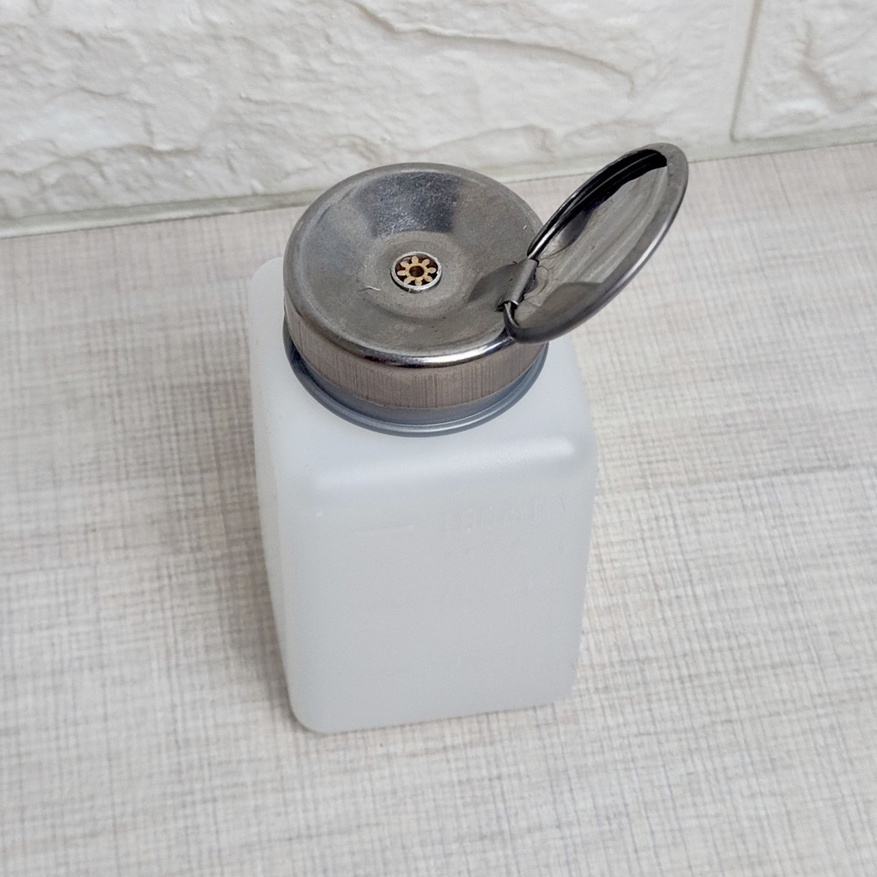 Пластиковий дозатор для рідин 180мл