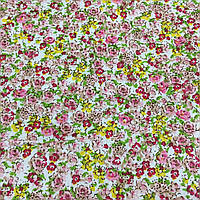 Ткань с мелкими красными и розовыми цветочками