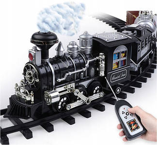 Залізна дорога - поїзд що випускає пар з пультом управління