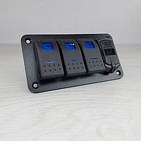 Панелі з 3 перемикачами, двома USB-портами та цифровим вольтметром.