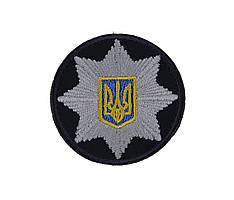 Кокарда поліцейська (на липучці) темно-синя 6см