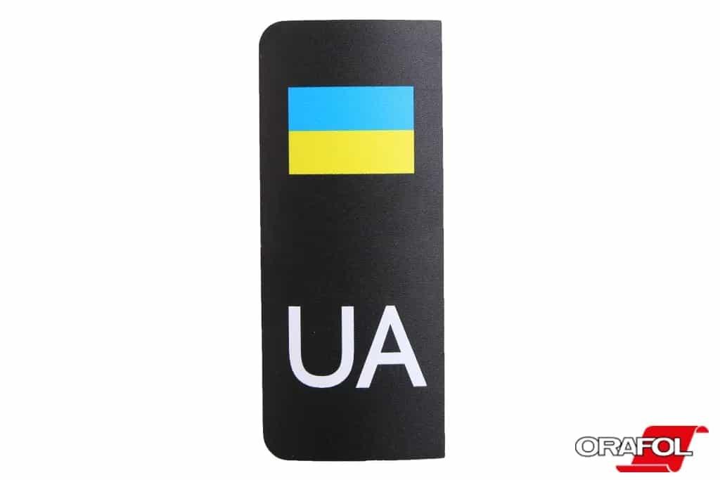 Наклейка на номерний знак мала UA з прапором чорна 4*10 см