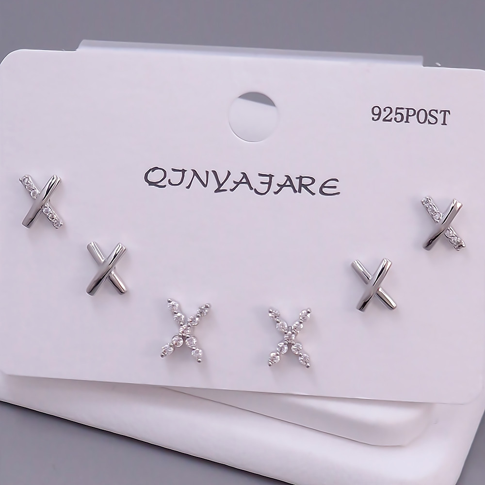 Набір із 3-х пар сережок-гвоздиків FJ. Родій. Камені: білий циркон