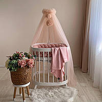 Балдахін із помпонами світла пудра