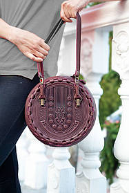 Кругла шкіряна сумка Берегиня темно-бордова, з короткими і довгим ремінцями