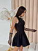 Чорна жіноча мінімалістична приталена коктейльна коротка сукня з костюмки з пишною спідницею, фото 6
