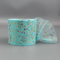 Фатин у рулонах 6 см, моток 22 м -  блакитний з золотими зірками