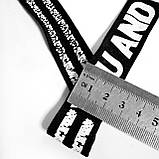 Трикотажна тасьма лампас 2,5см білий принт на чорному, фото 3