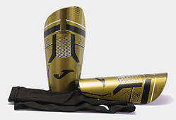 Щитки Joma J-PRO золотистий, чорний Чол M (зріст 135-155 см)