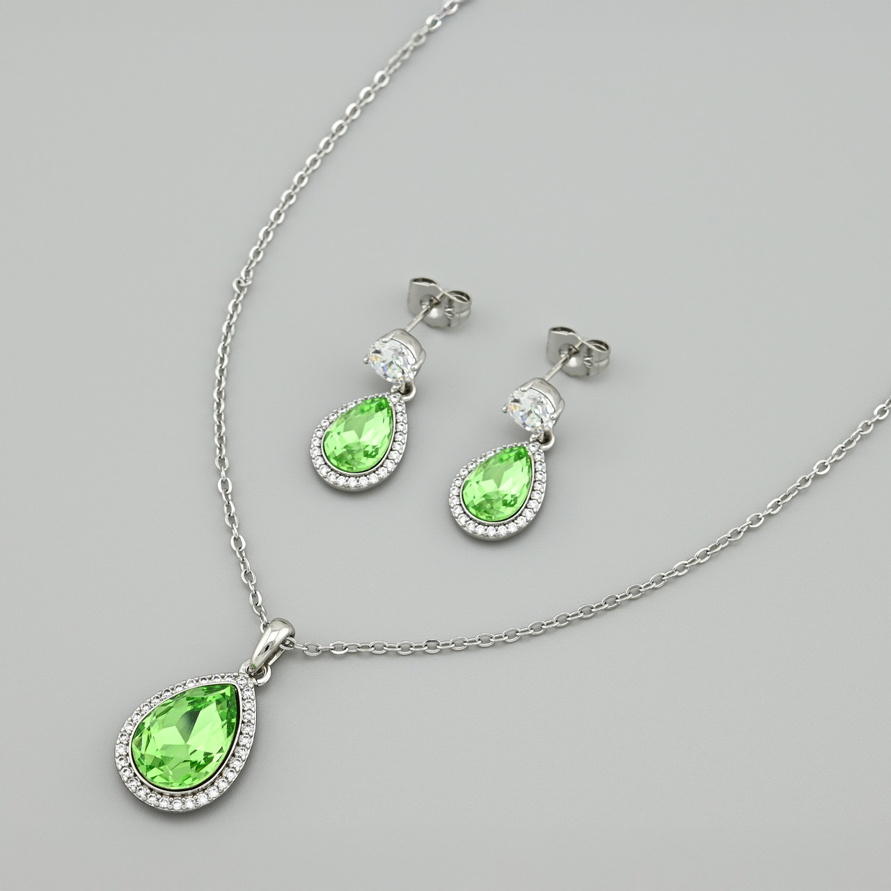 Набір із кристалами Swarovski 53236 кольє + сережки 24х10 мм колір салатовий позолота Біле Золотина 40+4