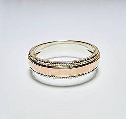 Срібна обручка з золотими накладками
