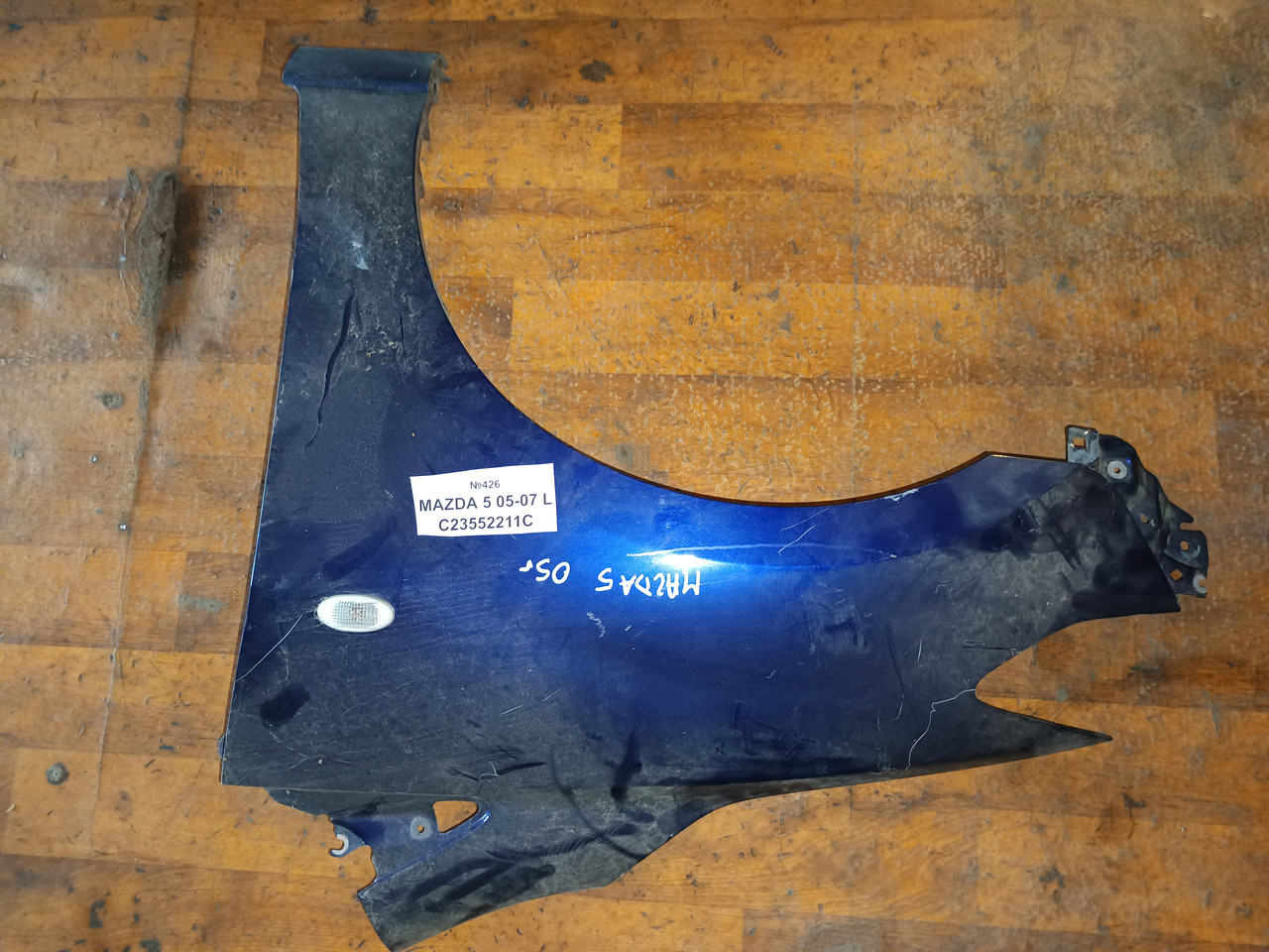 №426 Крило переднє ліве C23552211C для Mazda 5 05-07