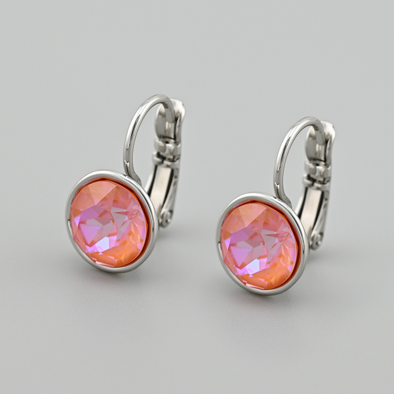 Сережки з кристалами Swarovski Сан Марино 40432 розмір 17х10 мм колір рожевий вага 3.1 г позолота Біле Золото
