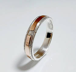 Срібна обручка з золотими накладками