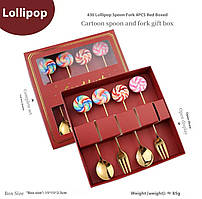 Подарунковий набір столових приладів з декором у вигляді апетитних льодяників - 2 ложки та 2 виделки золотого кольору.