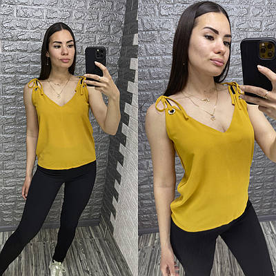 Літня майка з люверсами та зав'язками гірчичного кольору